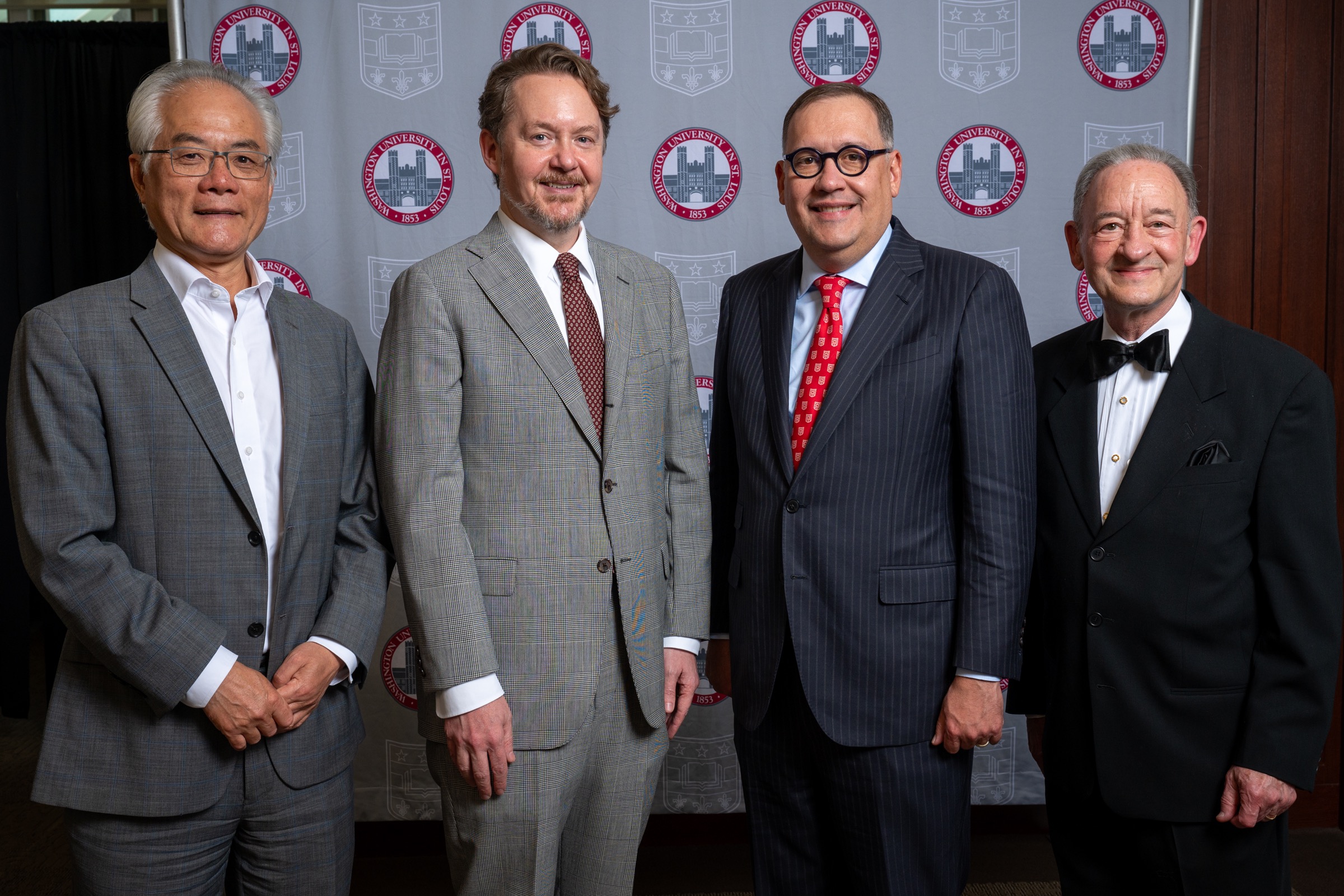 Feng Sheng Hu, Andrew Reeves, Chancellor Andrew Martin, and Chancellor Emeritus Mark Wrighton at the 2024 Weidenbaum Center annual reception